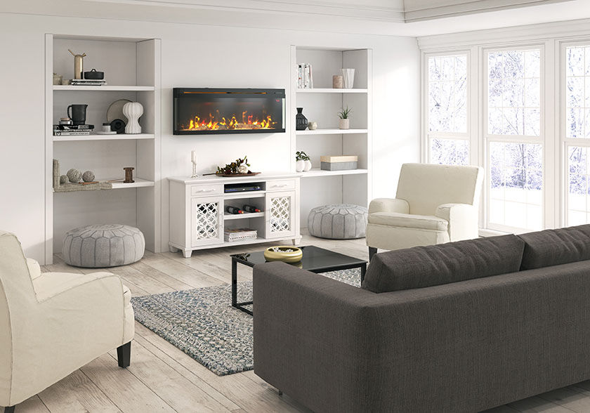 a wall mounted electric fireplace with three sided viewing hangs on the wall of a room full of neutral home decor